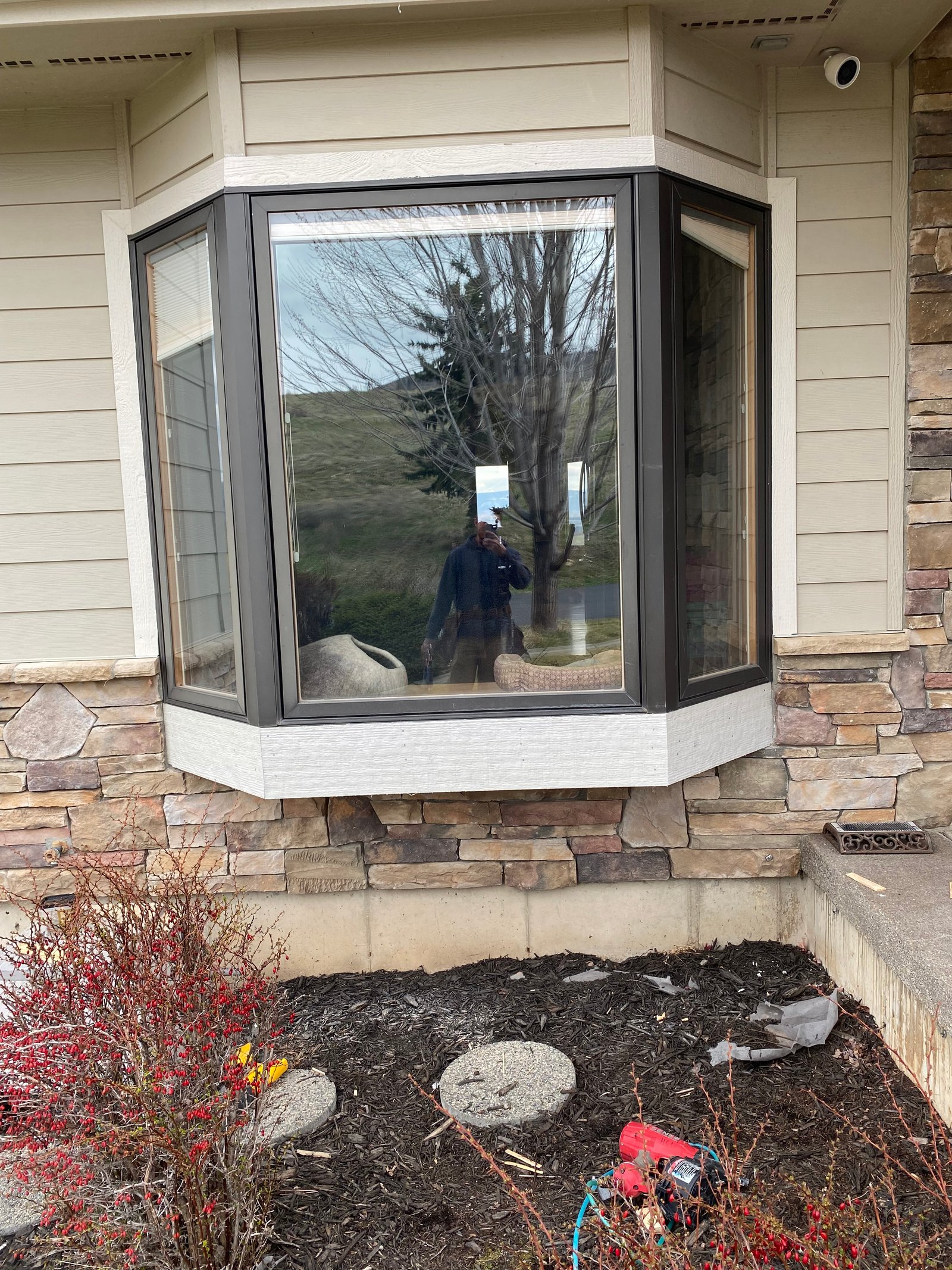 After photo of repaired bay window trim and base